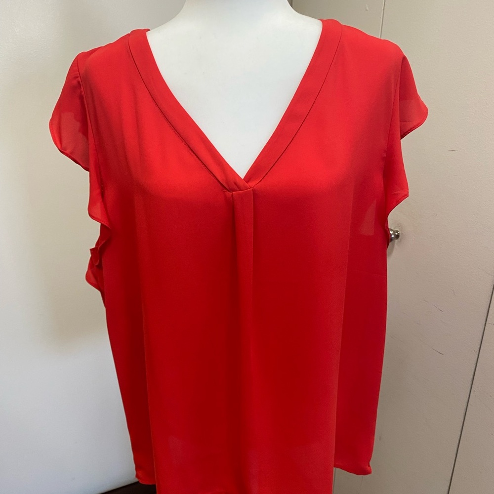 Beautiful bright poppy colored top perfect for any occasion.